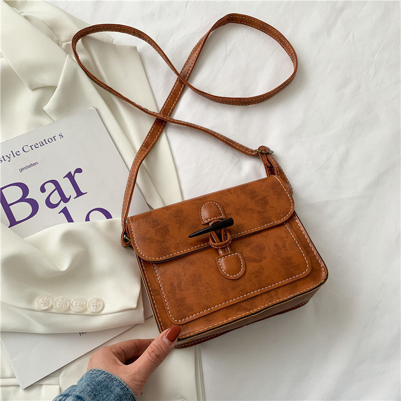 Korean Chic Art Crossbody leather Bag: Minimalist Style with Urban Elegance