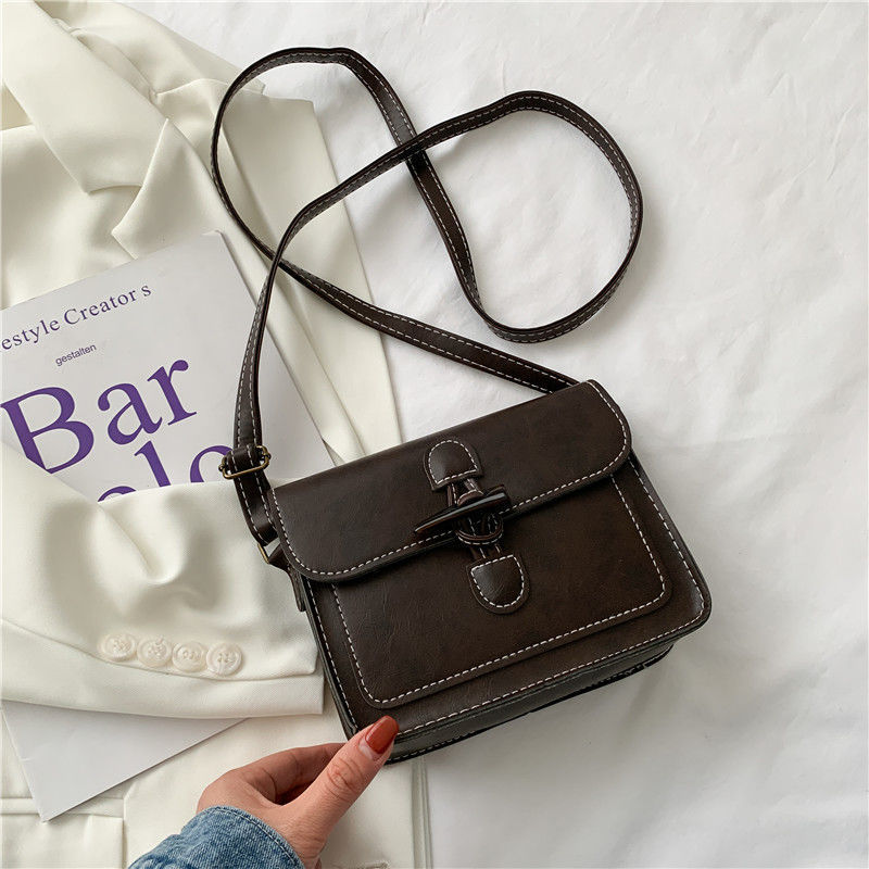 Korean Chic Art Crossbody leather Bag: Minimalist Style with Urban Elegance